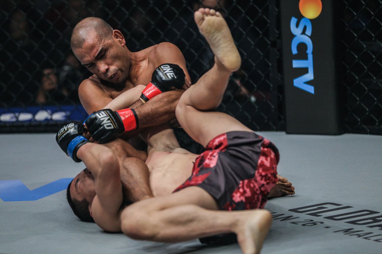 Filipino MMA star Rene Catalan goes for an armbar
