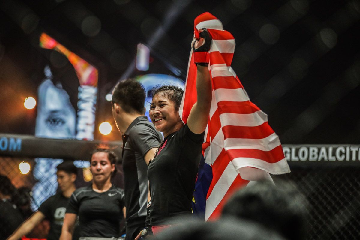 Jihin "Shadowcat" Radzuan celebrates her win against Puja Tomar