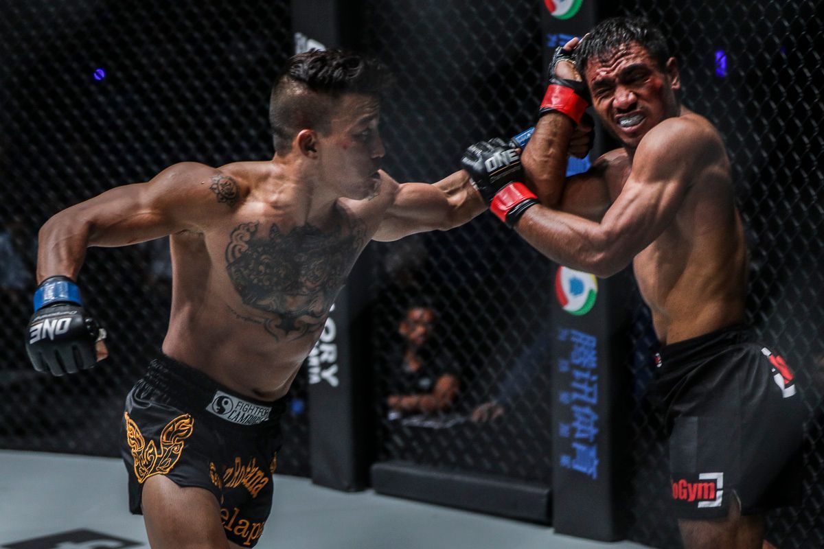 Cambodian MMA fighter Chan Rothana punches Abro Fernandes