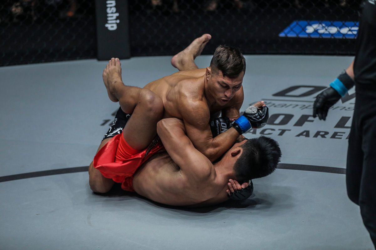 American MMA fighter Lowen Tynanes throws ground and pound in January 2019