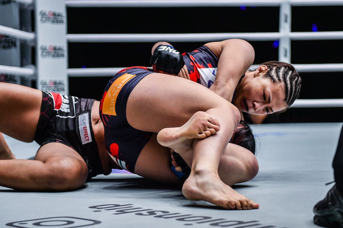 Japanese mixed martial artist Ayaka Miura locks up her trademark submission