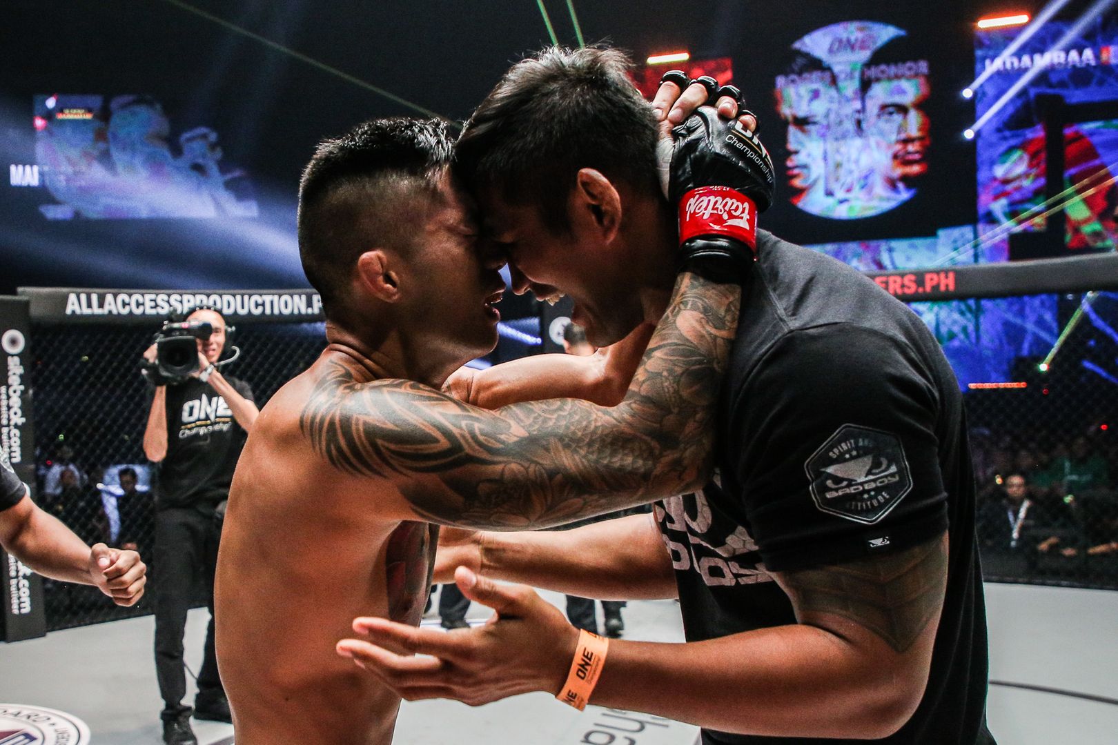 Martin Nguyen and Aung La N Sang celebrate a big win