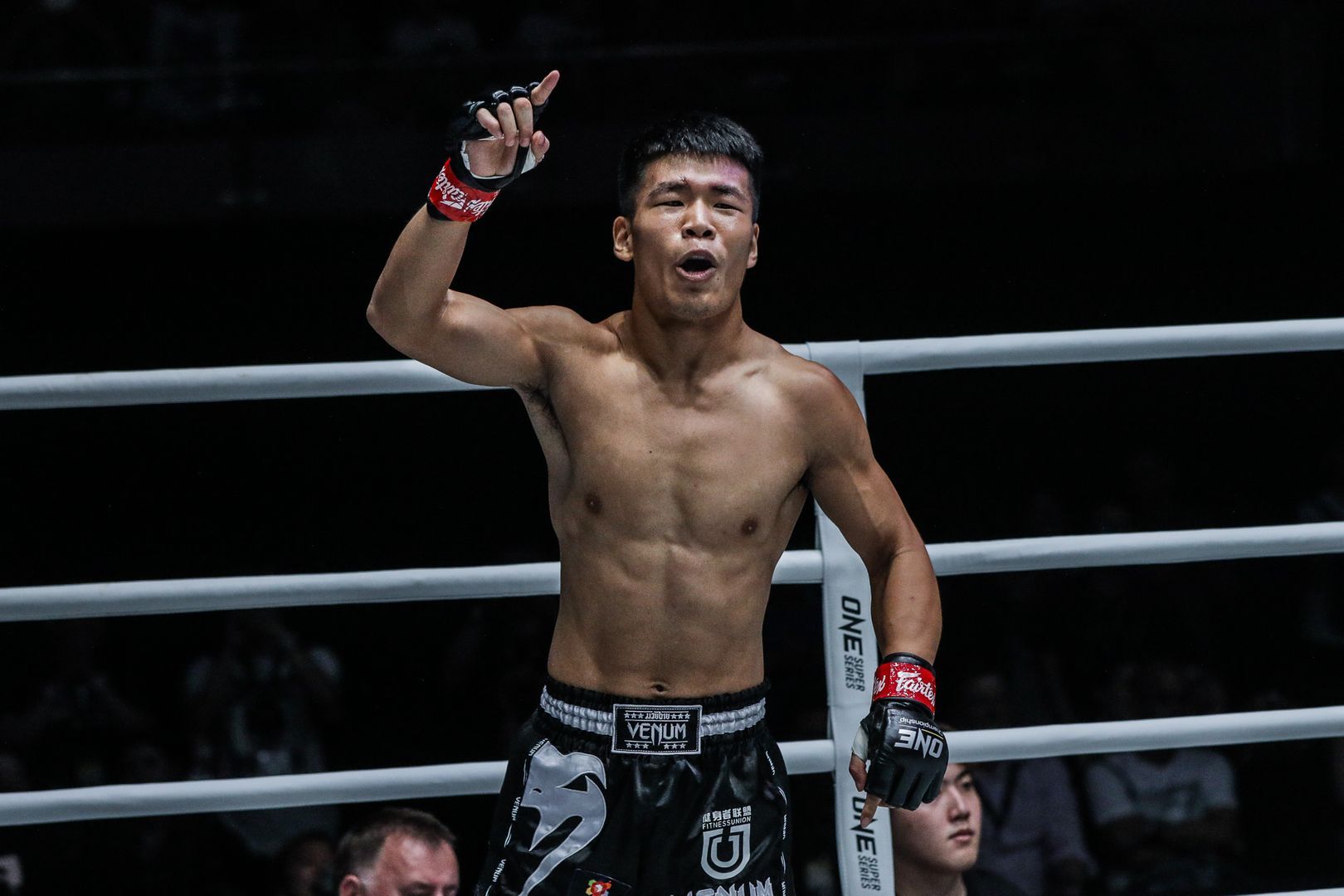 China's Zhang Chenglong celebrates his win over Tyler Hardcastle