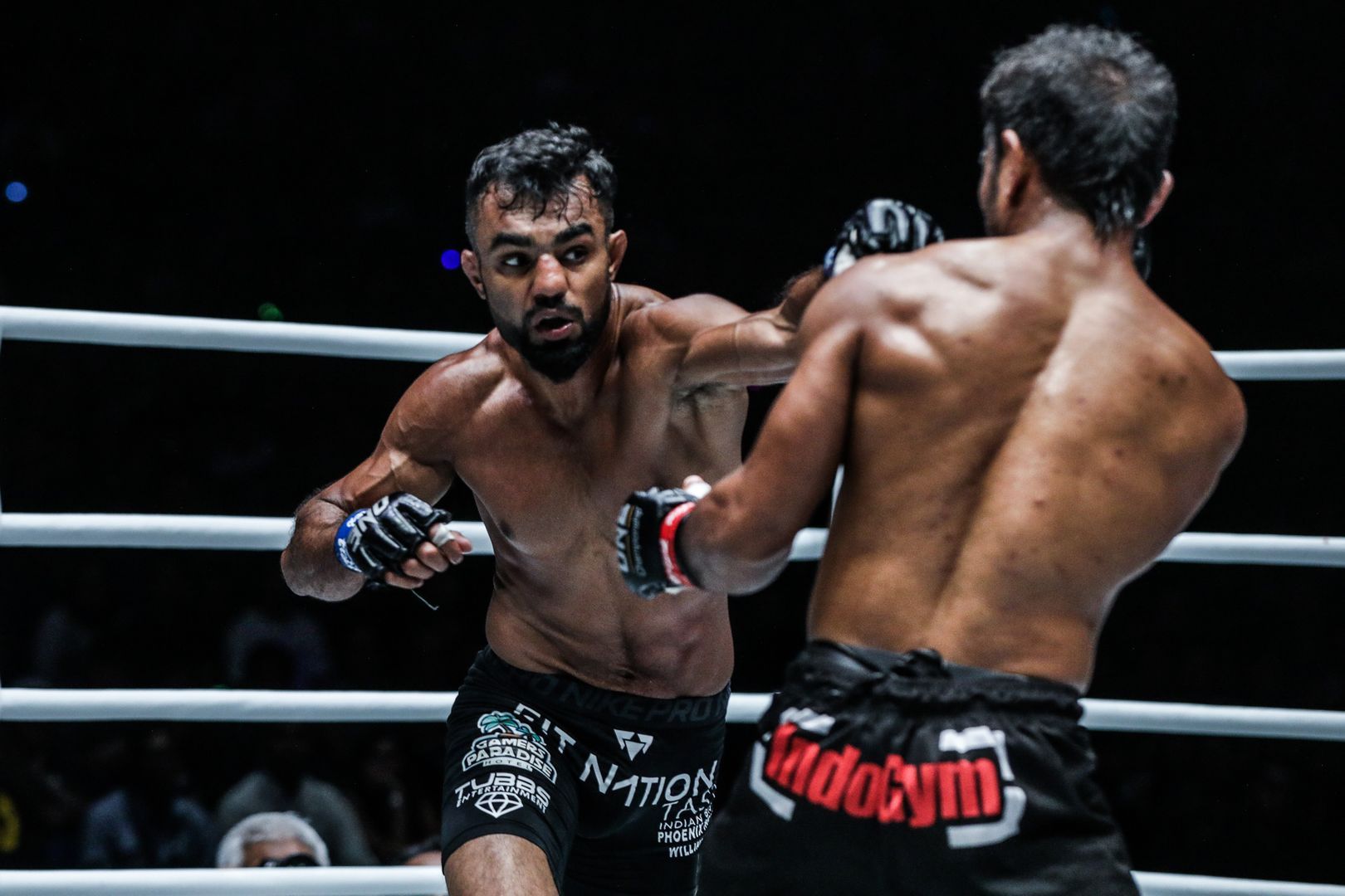 Indian MMA fighter Gurdarshan Mangat throws a punch