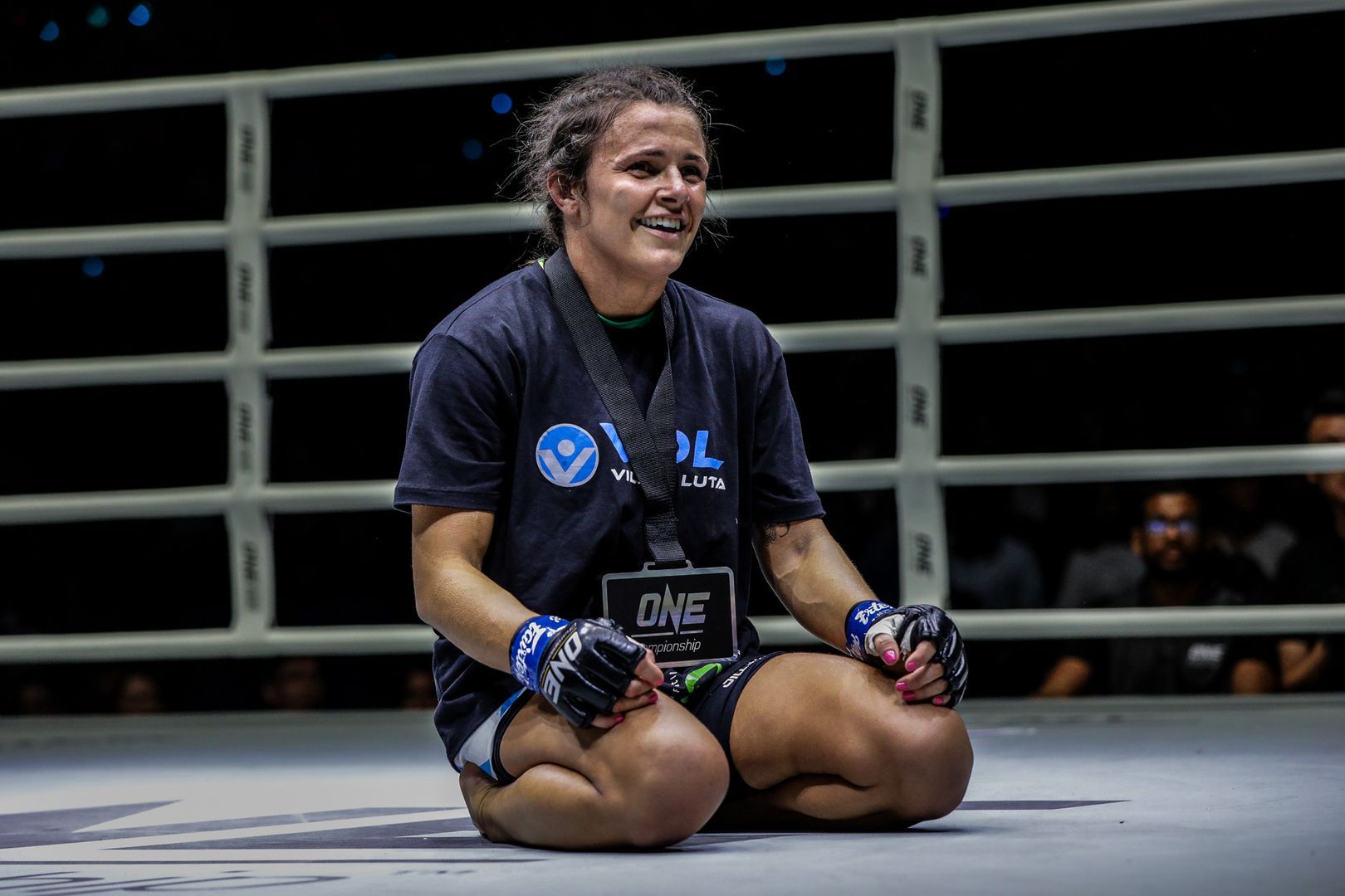 13-time Brazilian Jiu-Jitsu World Champion Michelle Nicolini wears the winner's medal following her win