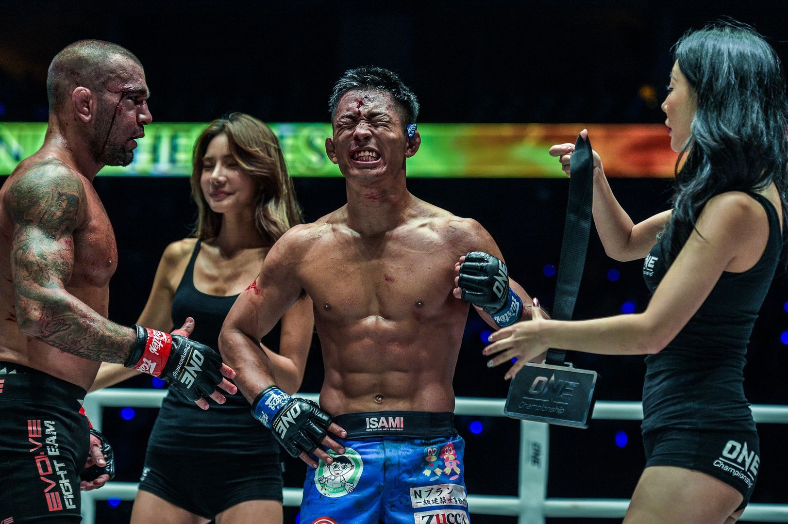Japanese MMA fighter Daichi Takenaka is awarded his winner's medal at ONE: DAWN OF HEROES.