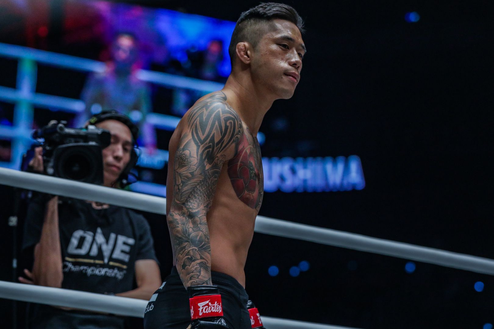 ONE Featherweight World Champion Martin Nguyen stands poised in the ring at ONE: DAWN OF HEROES.
