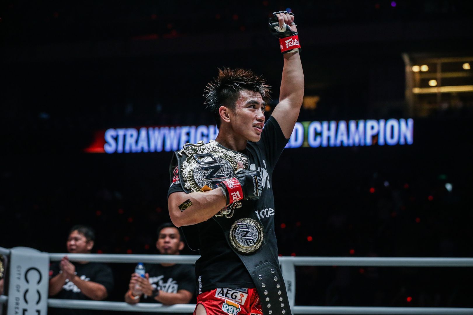 ONE Strawweight World Champion Joshua Pacio poses with the belt following his win over Rene Catalan in Manila