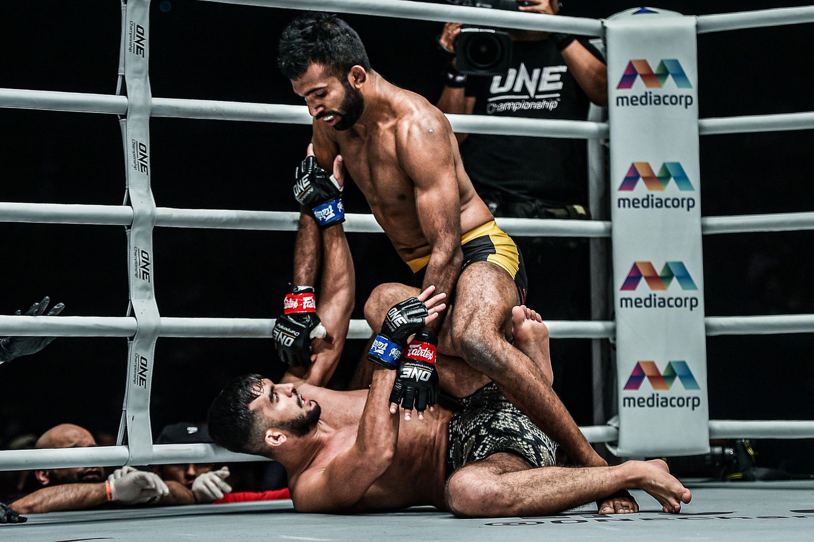 Indian mixed martial artist Rahul Raju goes for ground and pound