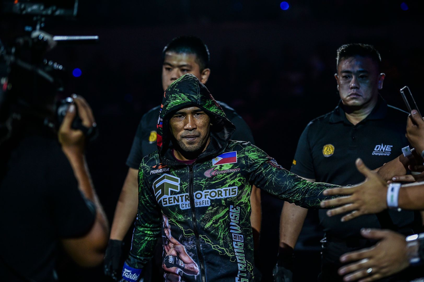 Filipino mixed martial artist Rene Catalan enters the Mall Of Asia Arena