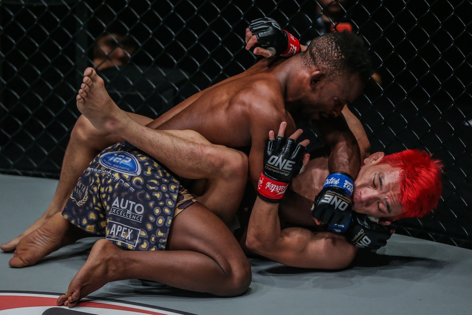Bokang “Little Giant” Masunyane drops ground strikes on Ryuto Sawada