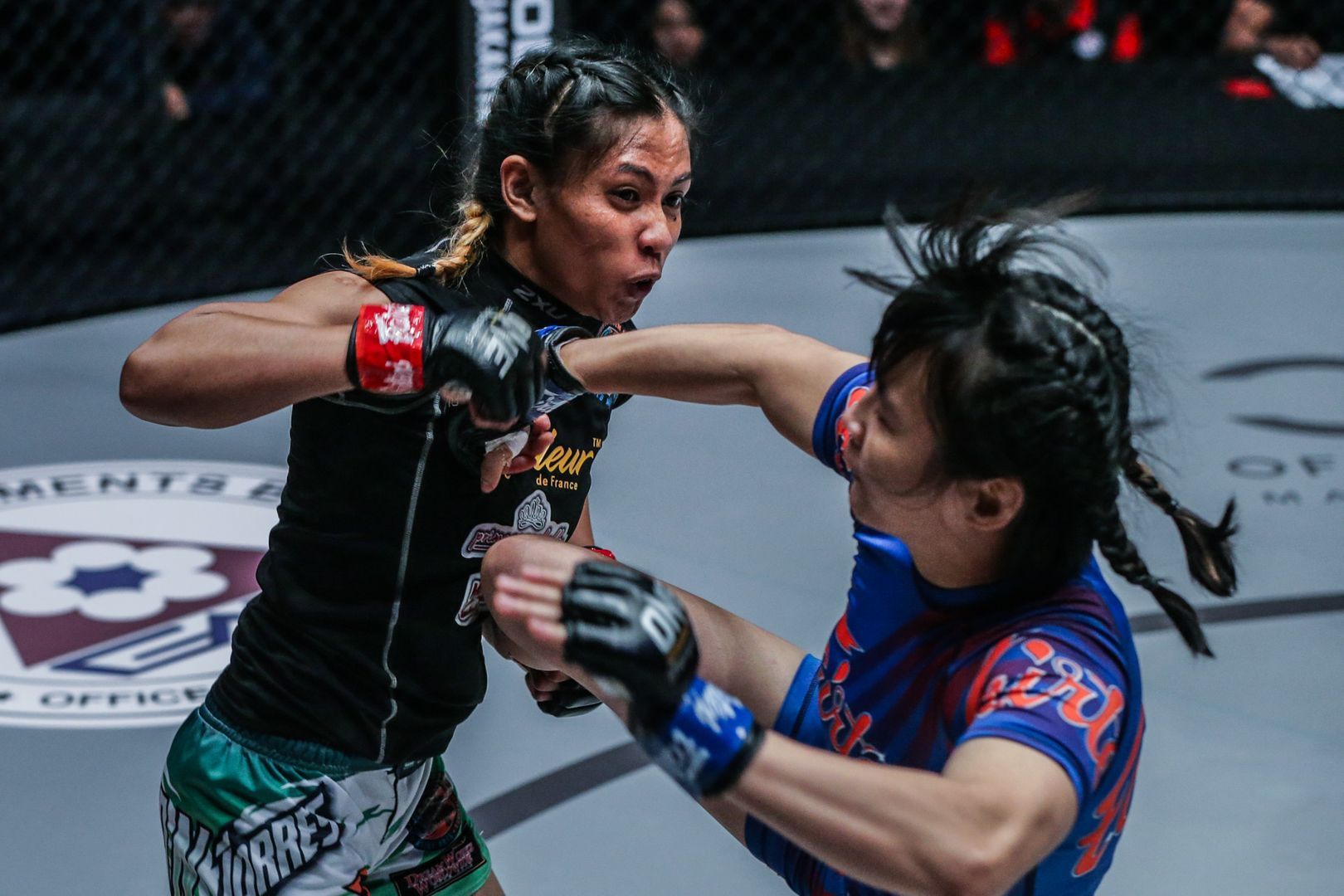 The Philippines' Jomary Torres squares off against China's Jenny Huang