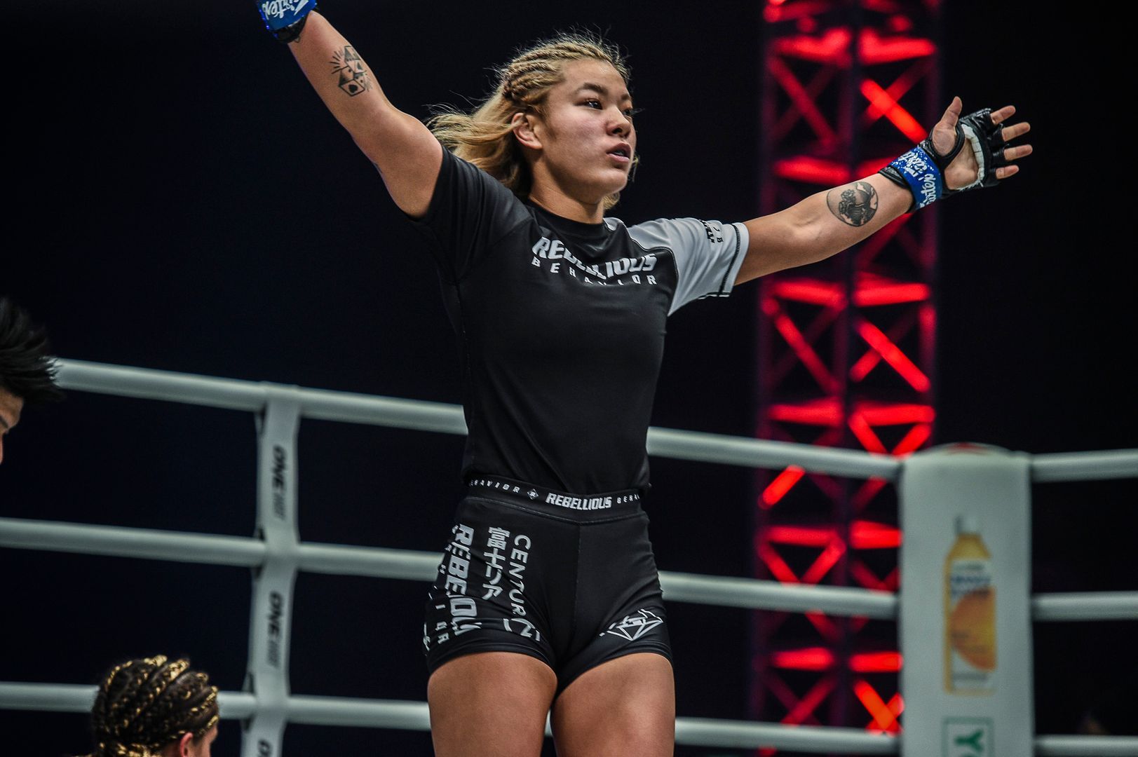 Itsuki Hirata celebrates her win against Nyrene Crowley