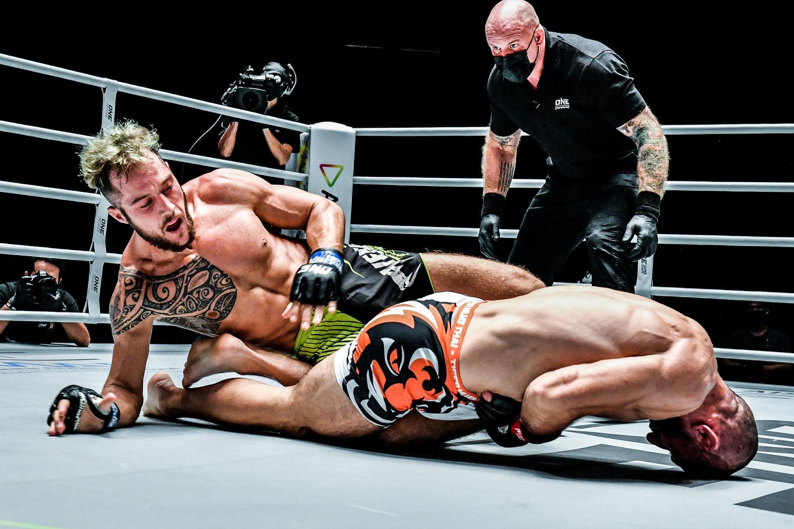 Russian lightweight Abu Muslim Alikhanov goes for a leglock