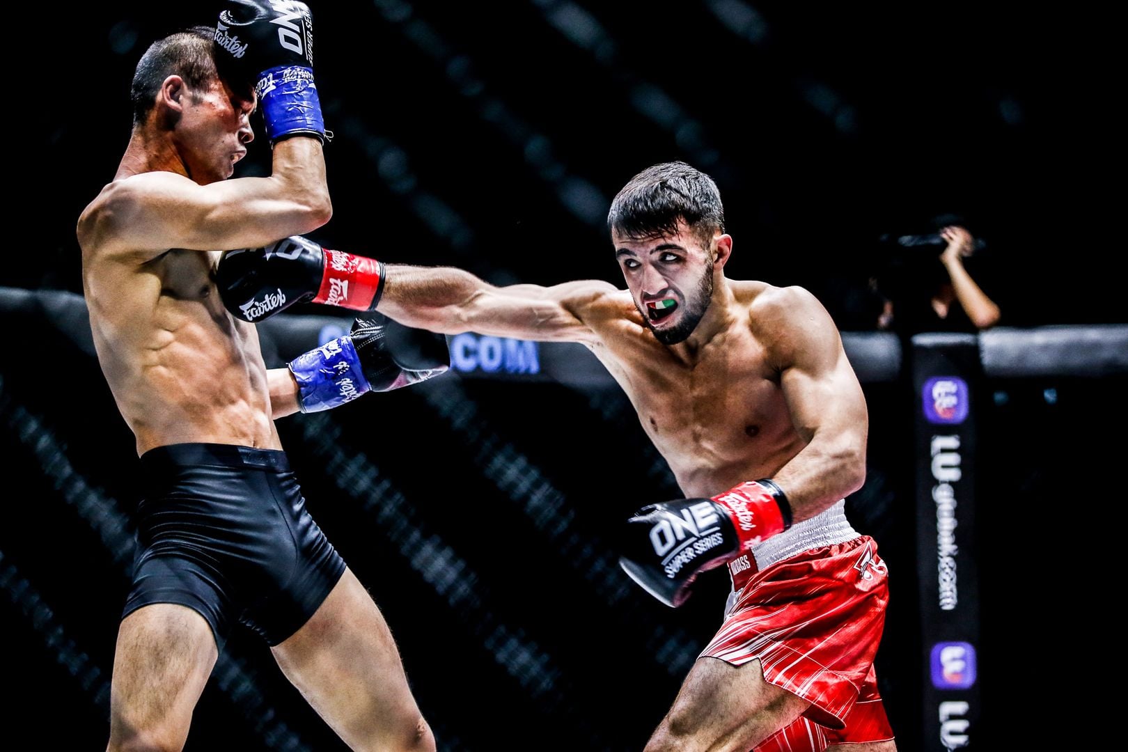 Russian fighter Aslanbek Zikreev fights former ONE World Title challenger Wang Junguang in a kickboxing match at ONE: INSIDE THE MATRIX IV