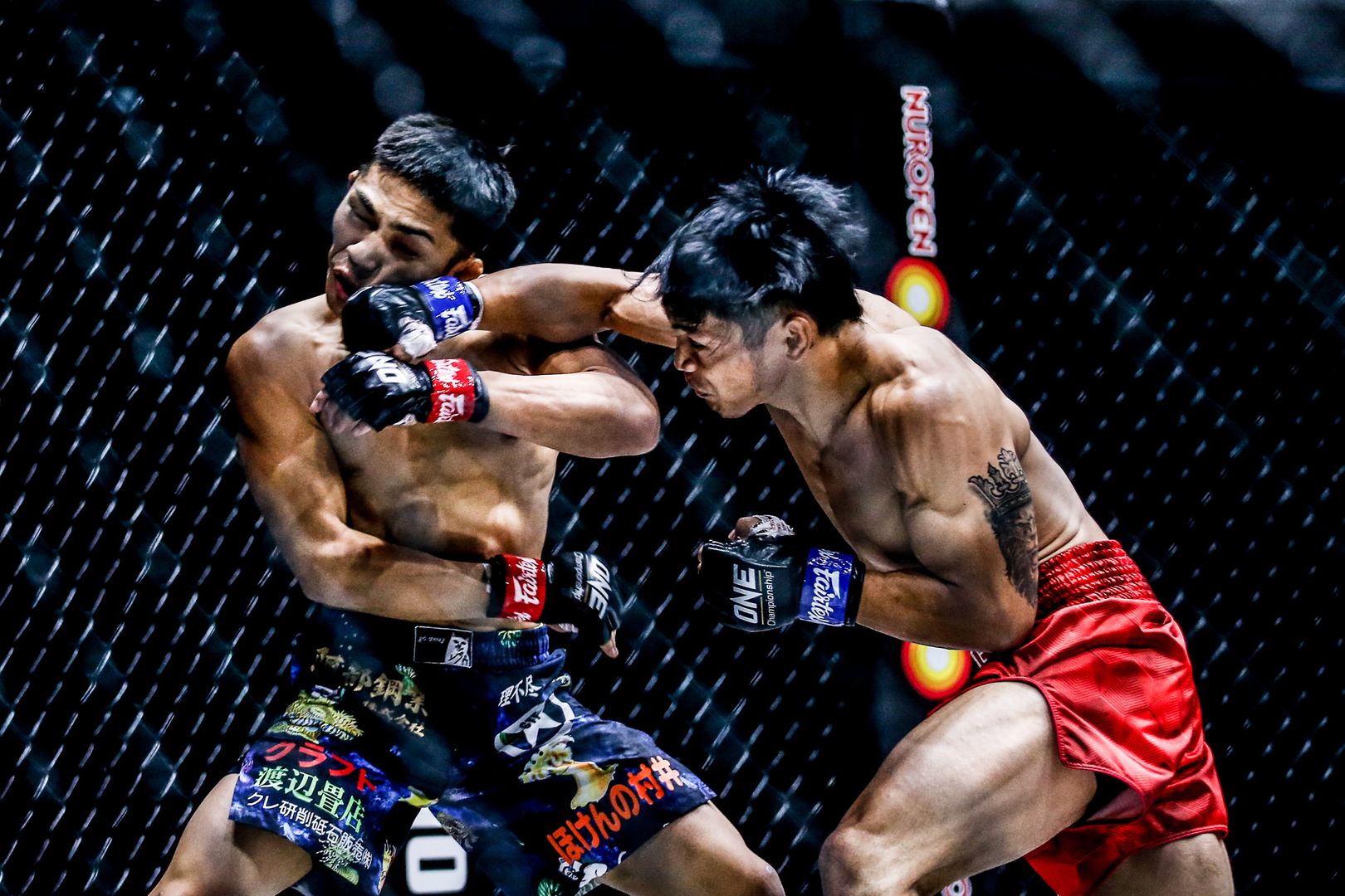 Lito Adiwang cracks Hiroba Minowa with a right hook