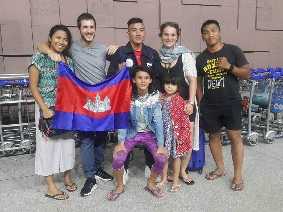Cambodian MMA star Chan Rothana with his wife, two daughters, and friends