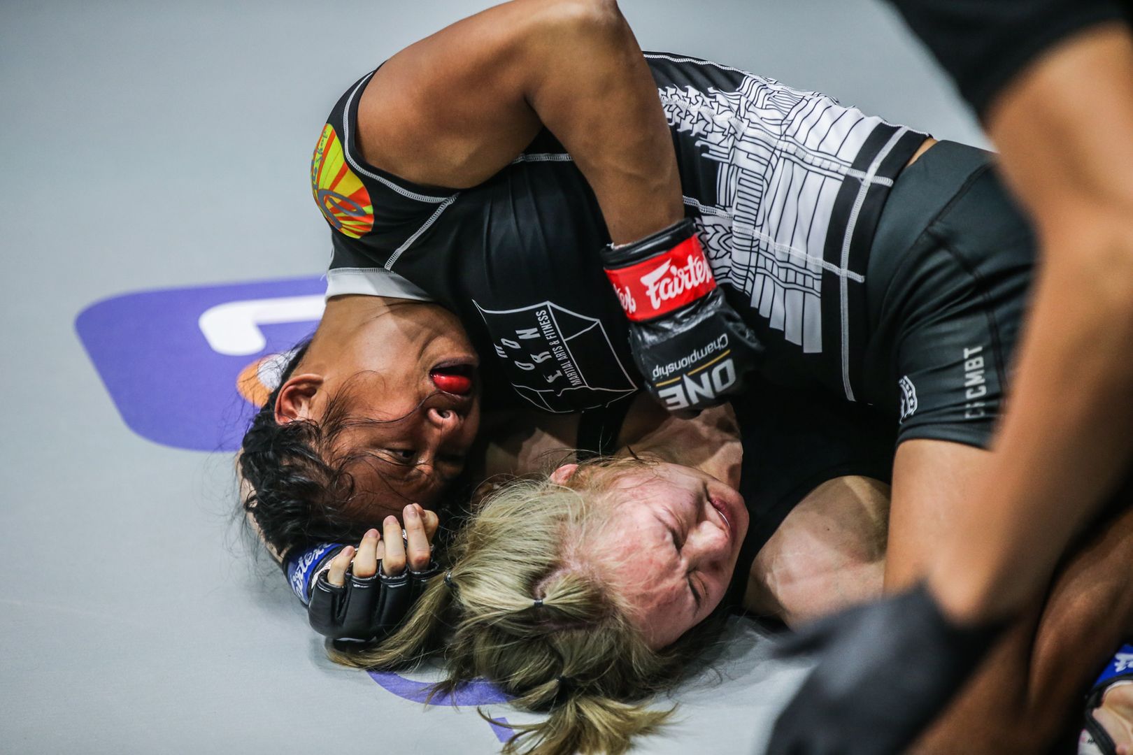 MMA fighters Sovannahry Em and Choi Jeong Yun compete at ONE: UNBREAKABLE II in January 2021