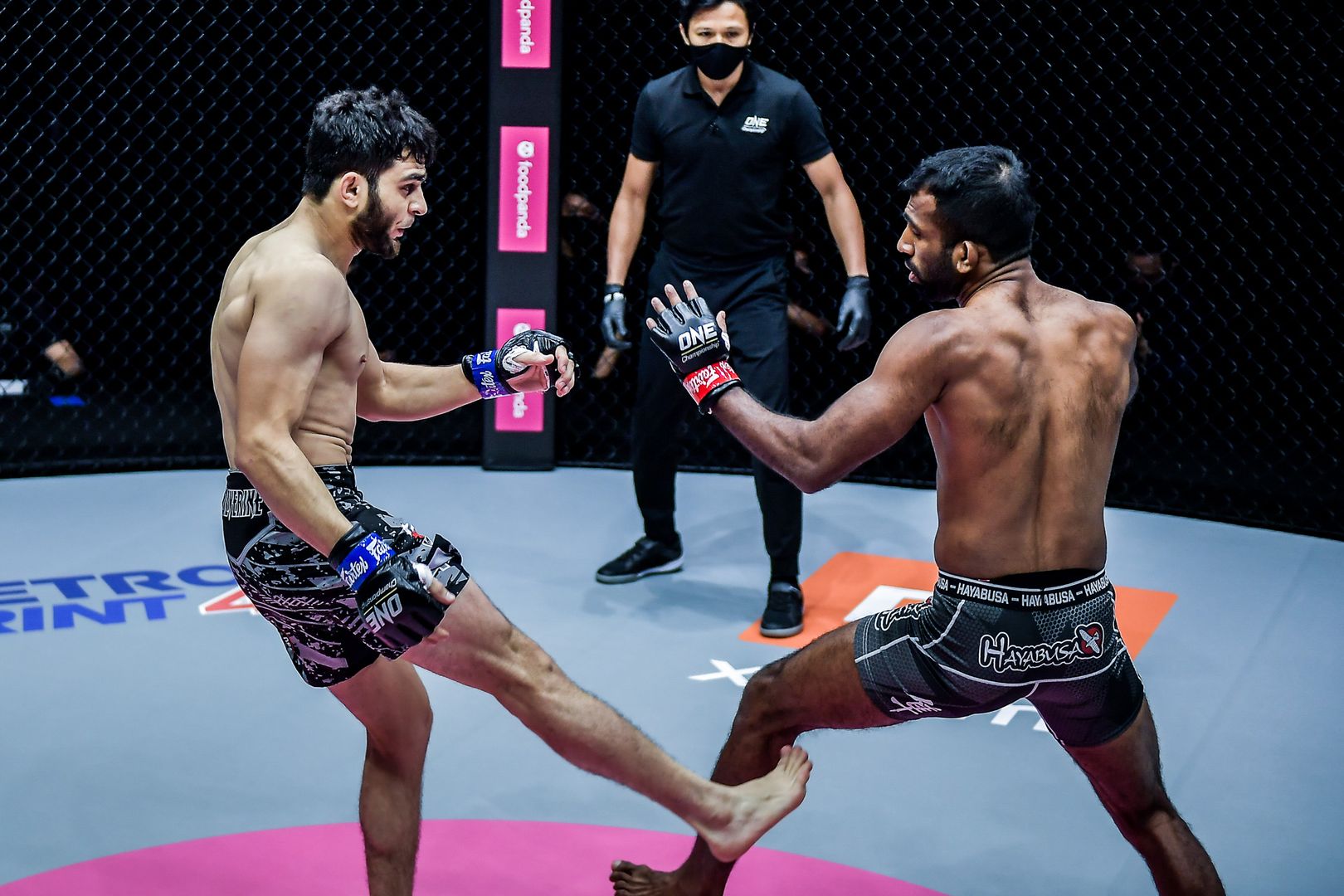Pakistan's Ahmed Mujtaba and India's Rahul Raju engage in an MMA fight at ONE: UNBREAKABLE III on 5 February 2021