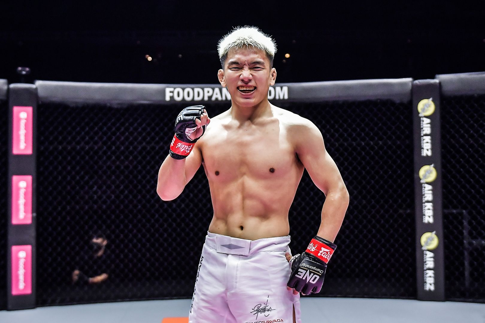 Japanese MMA fighter Ryuto Sawada celebrates a big victory over Robin Catalan