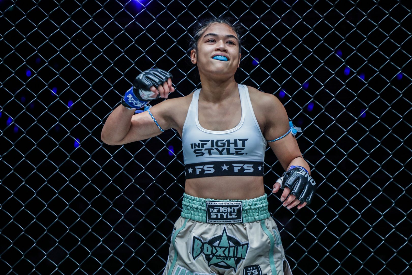 Jackie Buntan pumps her fist before her Muay Thai fight with Wondergirl Fairtex