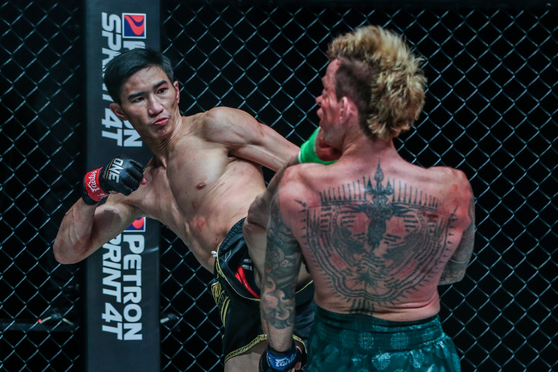 Pictures from the Muay Thai bout between Tawanchai PK.Saenchai Muaythaigym and Sean Clancy at ONE: DANGAL on 15 May