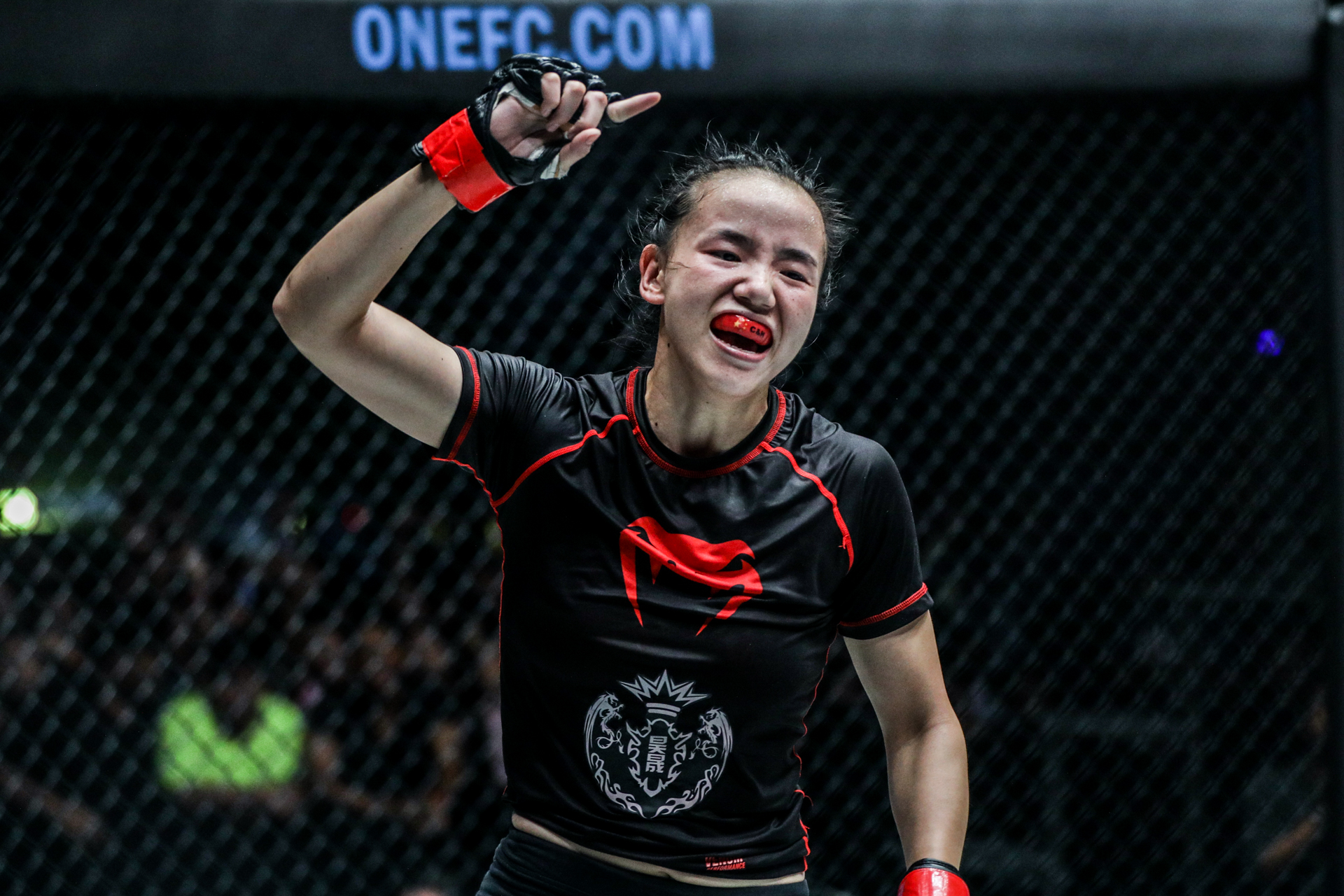 Lin Heqin celebrates a win.jpg