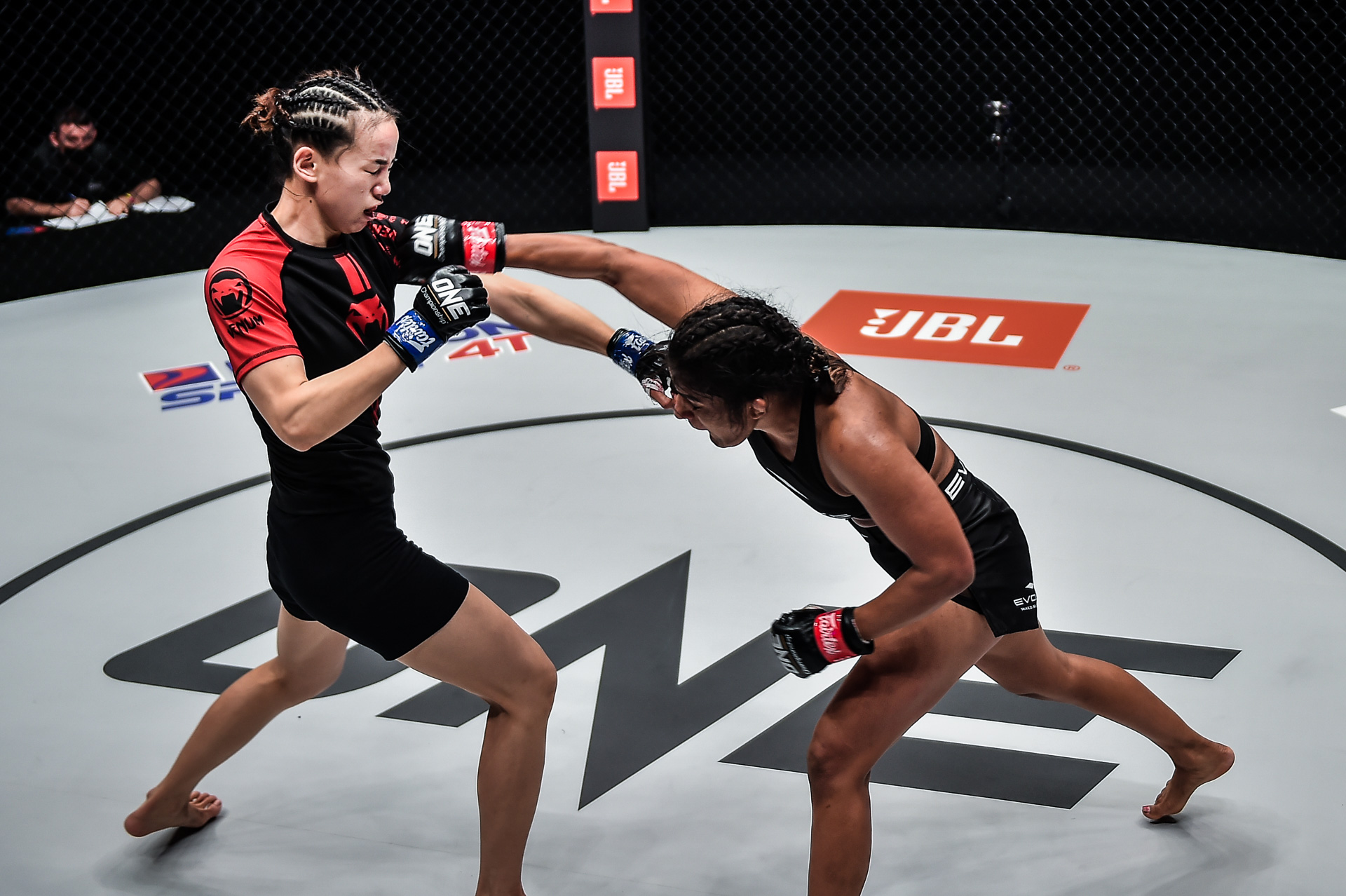 Pictures from the bout between Ritu Phogat and Lin Heqin at ONE: BATTLEGROUND