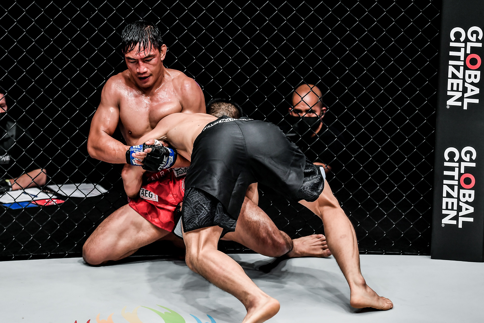 Pictures from the lightweight showdown between Eduard Folayang and Zhang Lipeng at ONE: BATTLEGROUND II