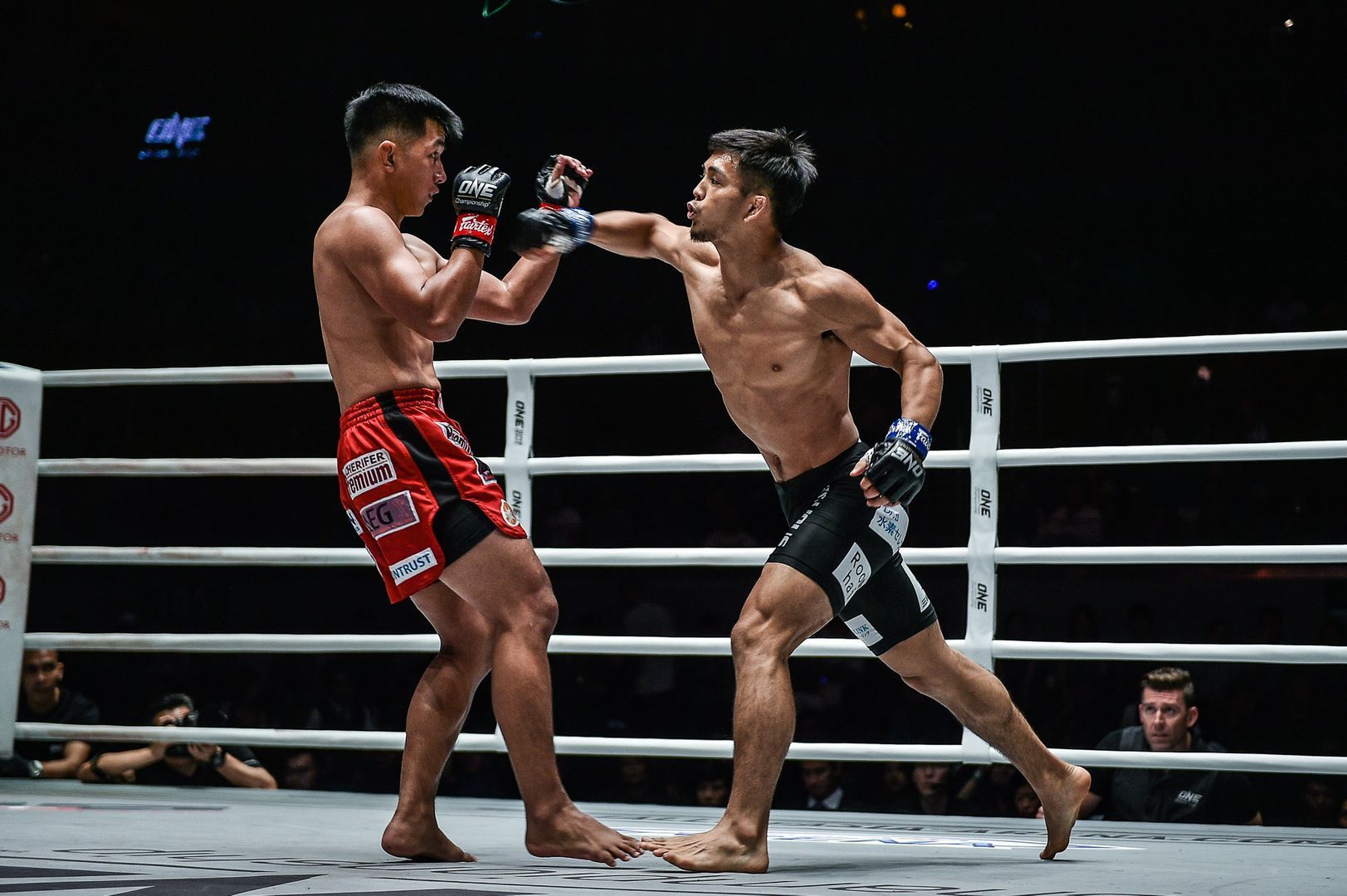 Japanese rising martial arts star throws a cross at former ONE Flyweight World Champion Geje Eustaquio